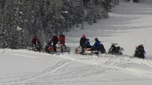 Group of 2012 snowmobiles in West Yellowstone.