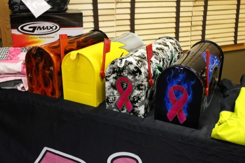 Hand-painted mailboxes for the live auction.